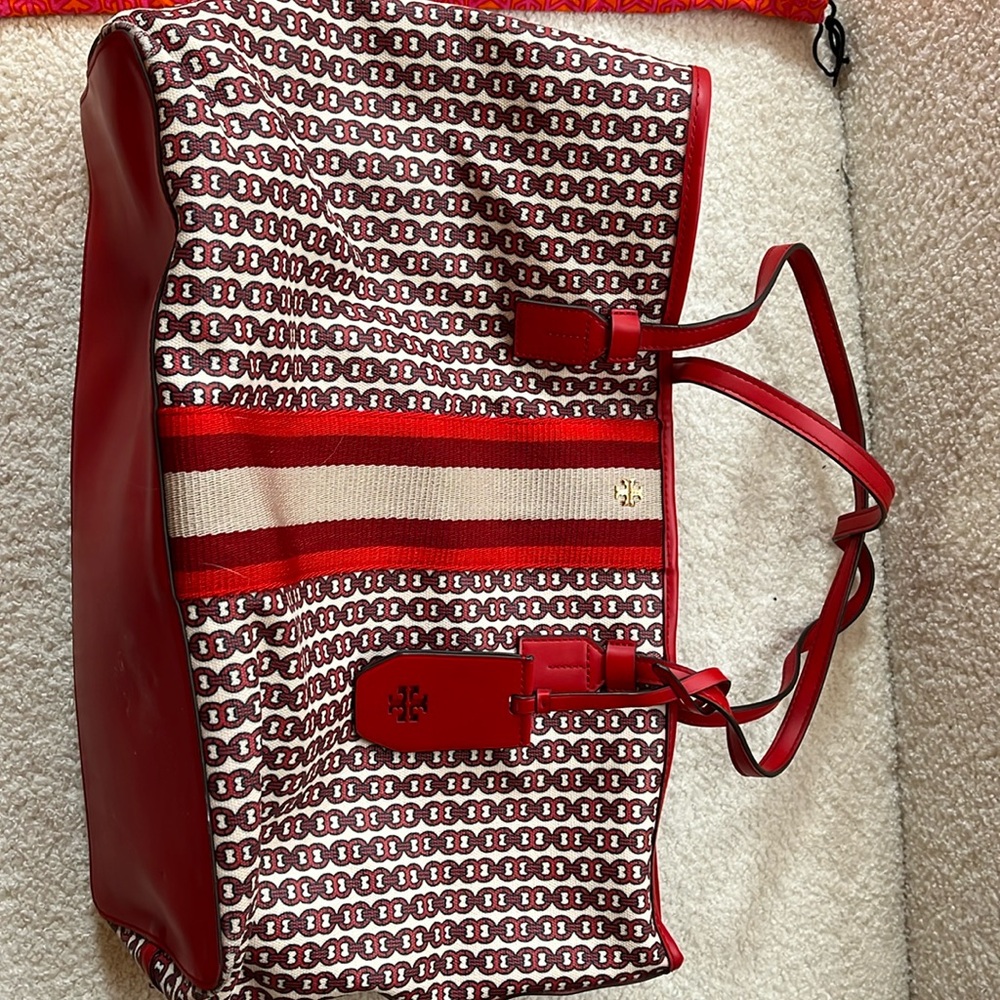 Tory Burch large purse red and cream. Slightly used